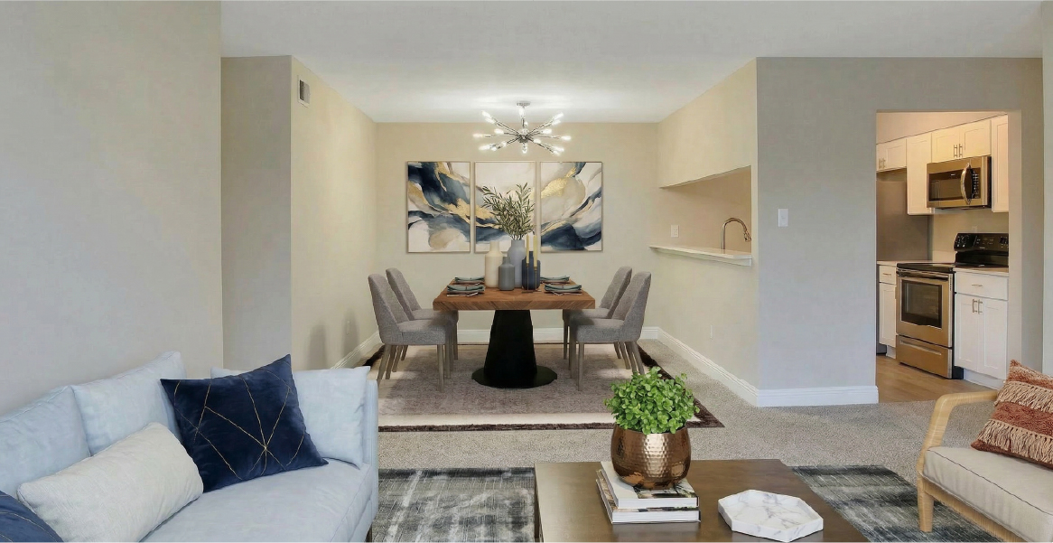 Elegant dining area with modern chandelier in an apartment at Riviere Royale New Orleans East