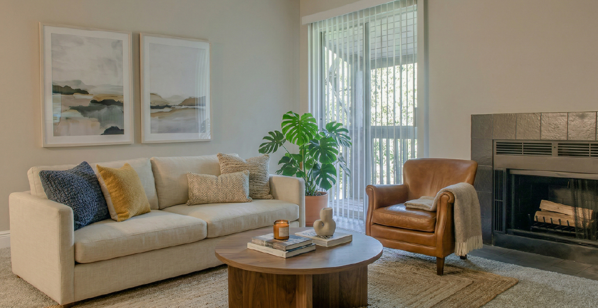 Stylish living room with natural light in an apartment at Riviere Royale in New Orleans East